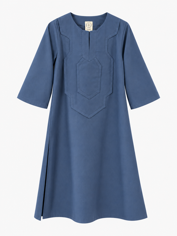 A slate blue kaftan dress with three-quarter sleeves and a decorative stitched chest panel, shown against a plain white background.